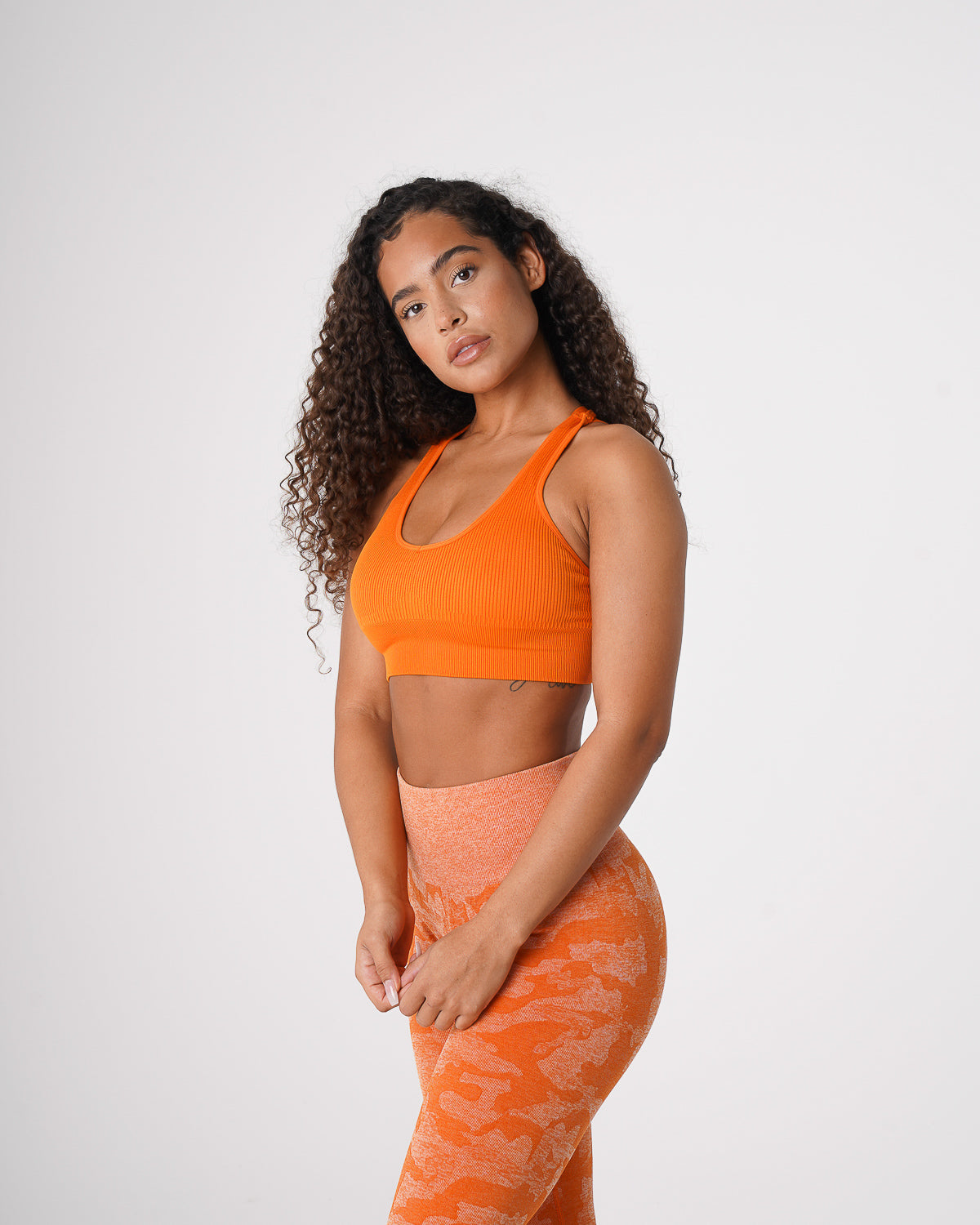 Burnt Orange Galaxy Ribbed Seamless Bra Burnt Orange | NVGTN For Sale