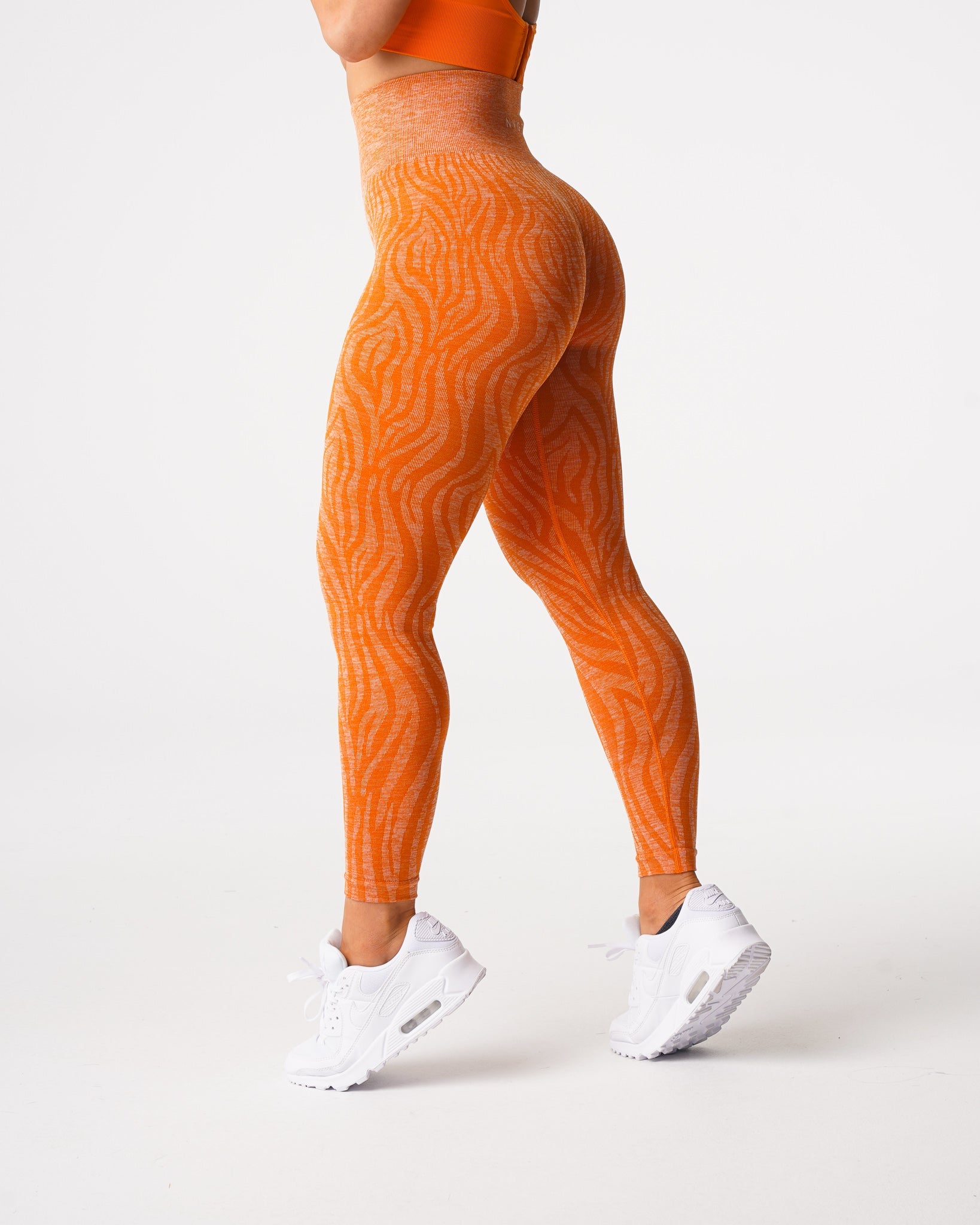 Burnt Orange Zebra Seamless Leggings Burnt Orange | NVGTN Outlet