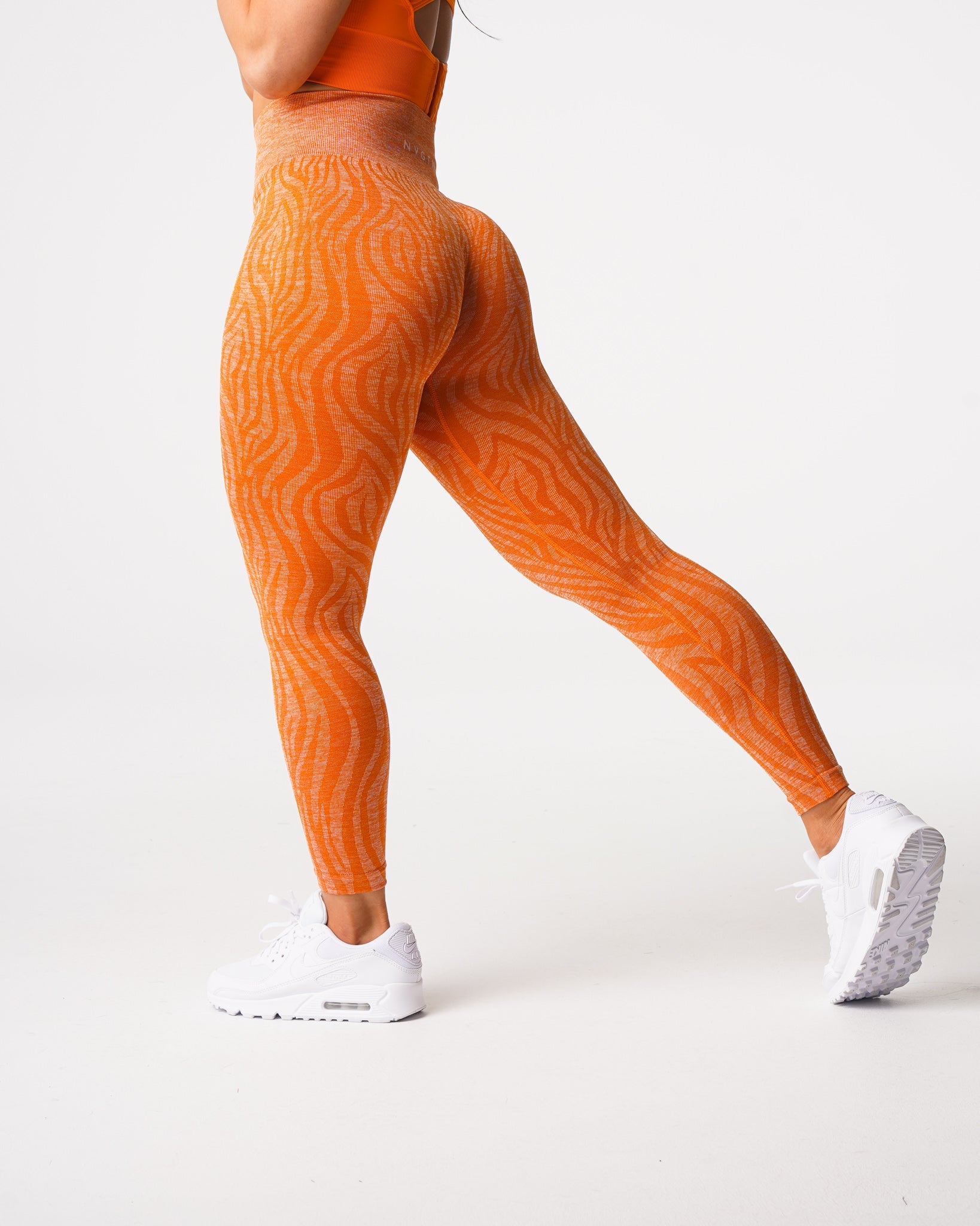 Burnt Orange Zebra Seamless Leggings Burnt Orange | NVGTN Outlet